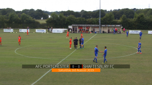 Teams prepare for kick-off at AFC Portchester with a large lower scorebug graphic